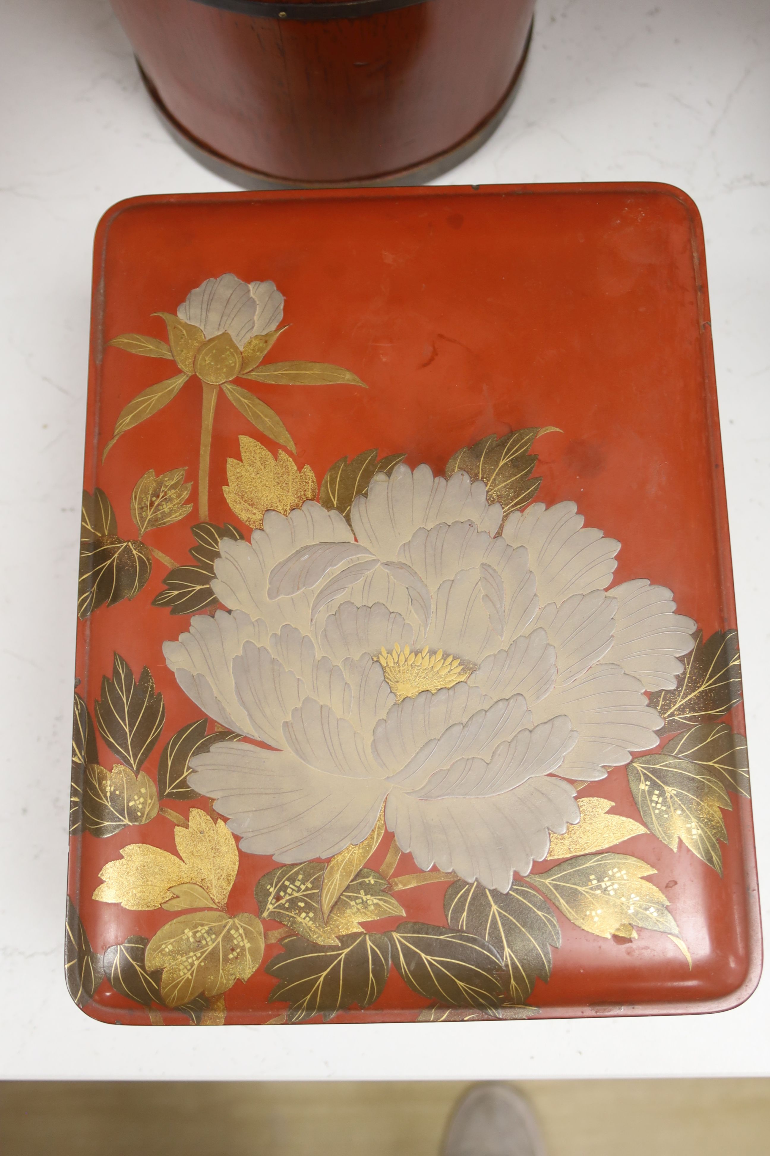 A Chinese red-lacquered rice container and cover and a similar Japanese rectangular box and cover (2)